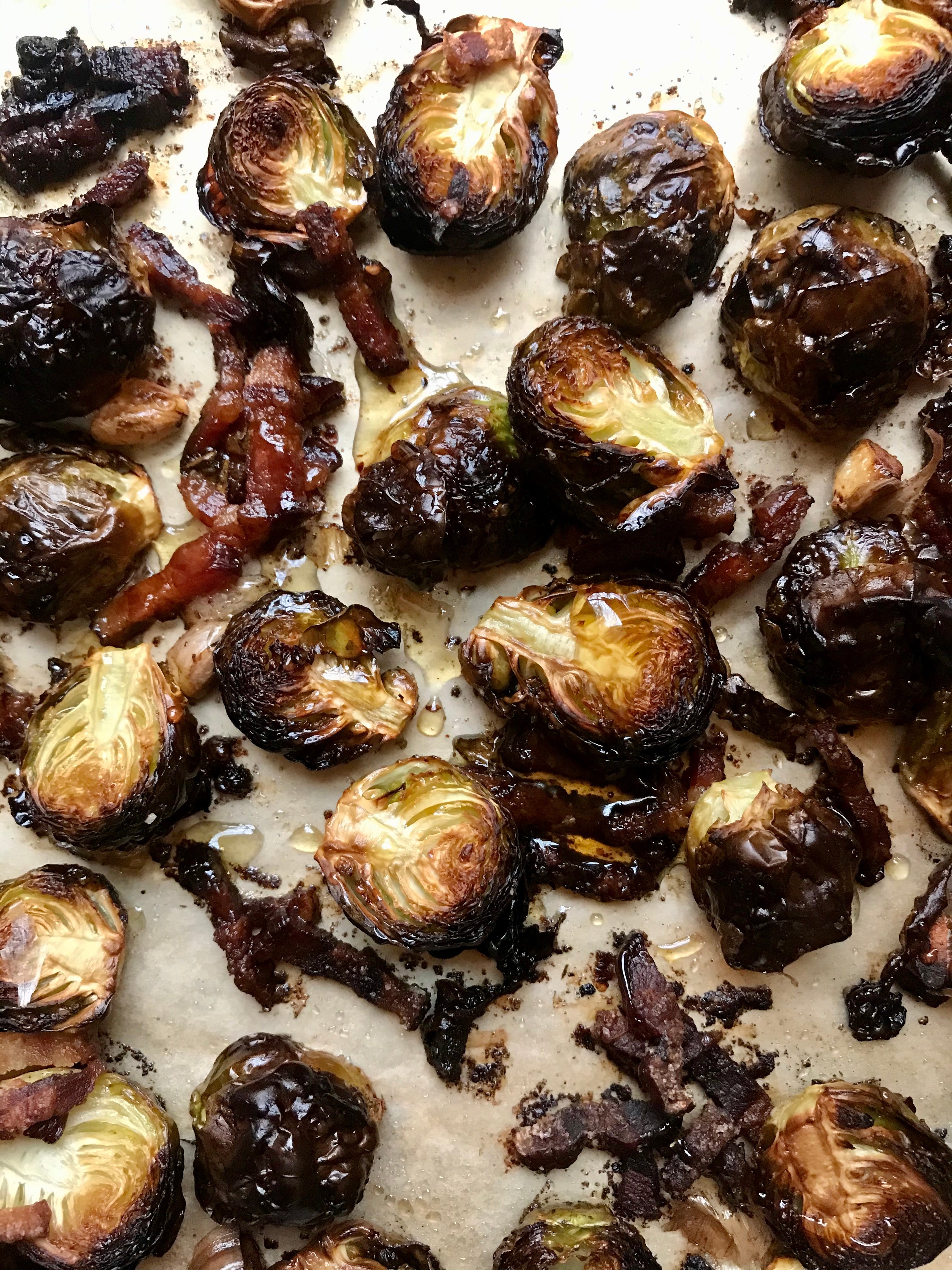 deeply roasted brussles sprouts on a metal sheet pan