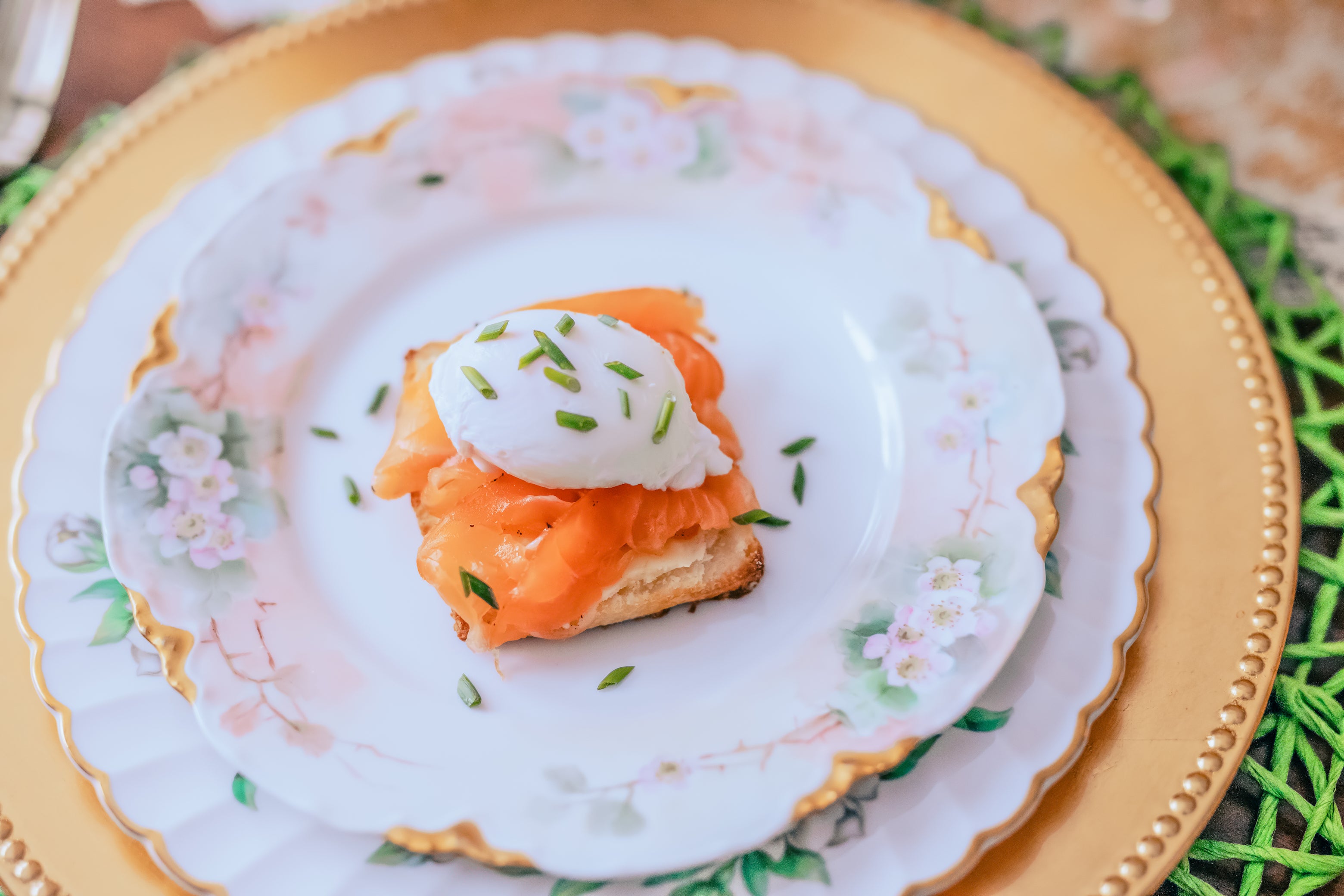 tea cured salmon benedict on honey biscuit with poached egg