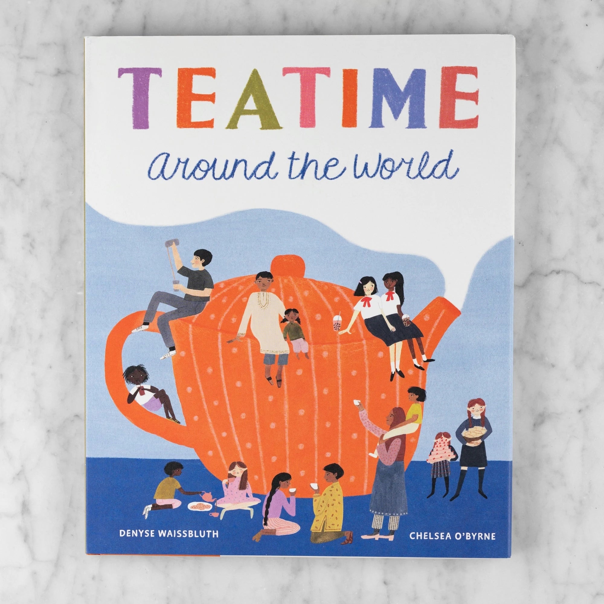 Front book cover of 'Teatime Around the World' with illustrations of people around a teapot on a marble surface. Authors: Denyse Waissbluth and Chelsea O'Byrne