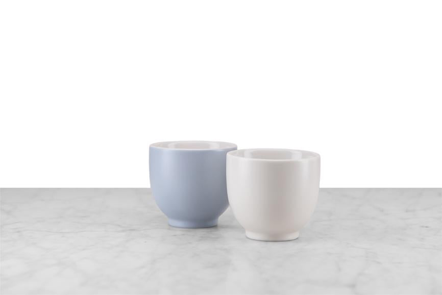 side by side of lavender and white tea cups
