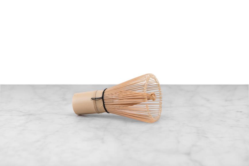 bamboo matcha whisk on its side