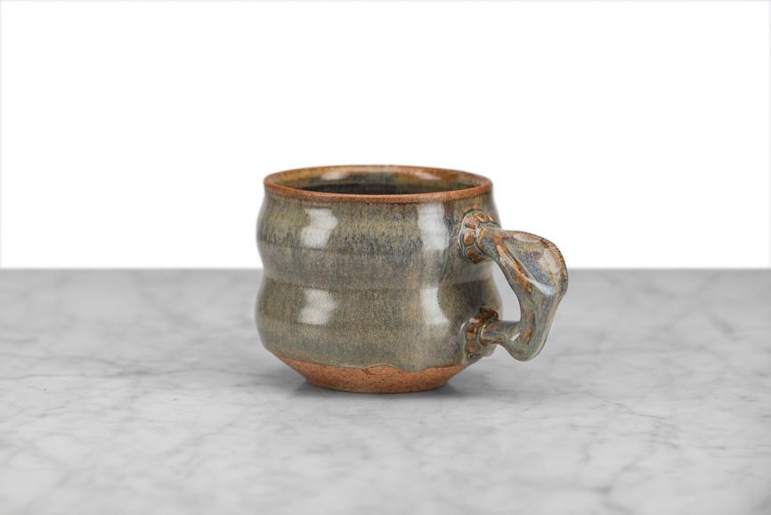 hand thrown coffee or tea mug in greenish gray glaze