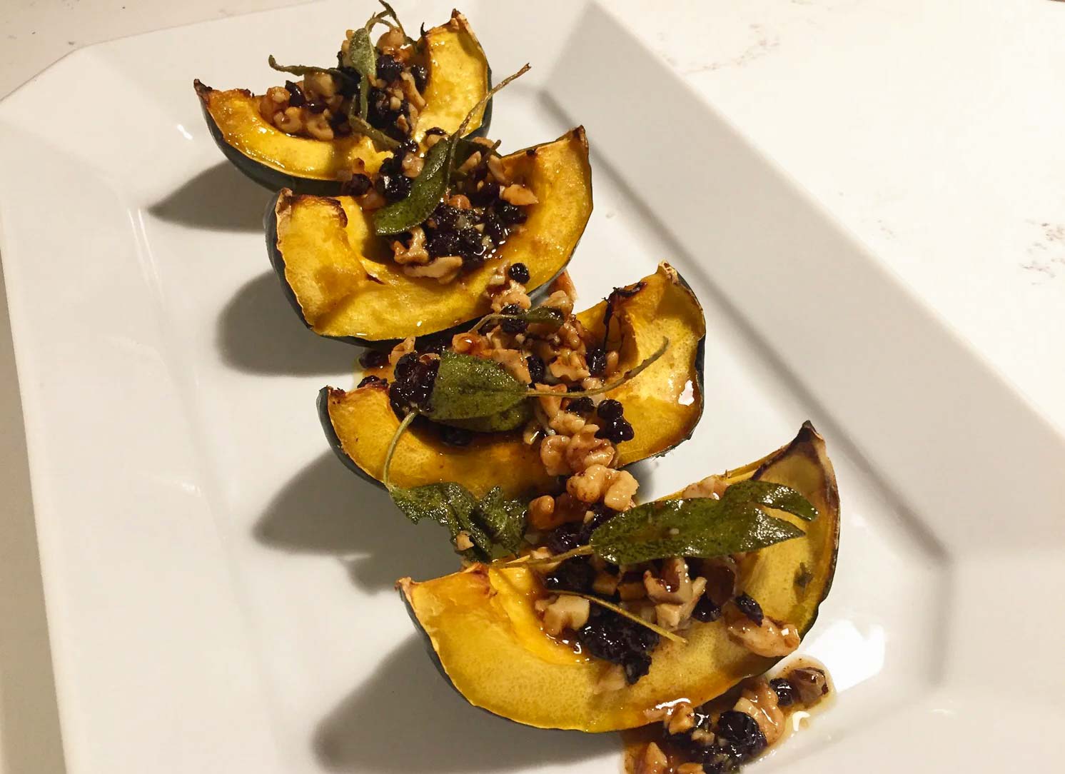 Roasted Acorn Squash with Currants, Walnuts & Cinnamon Honey