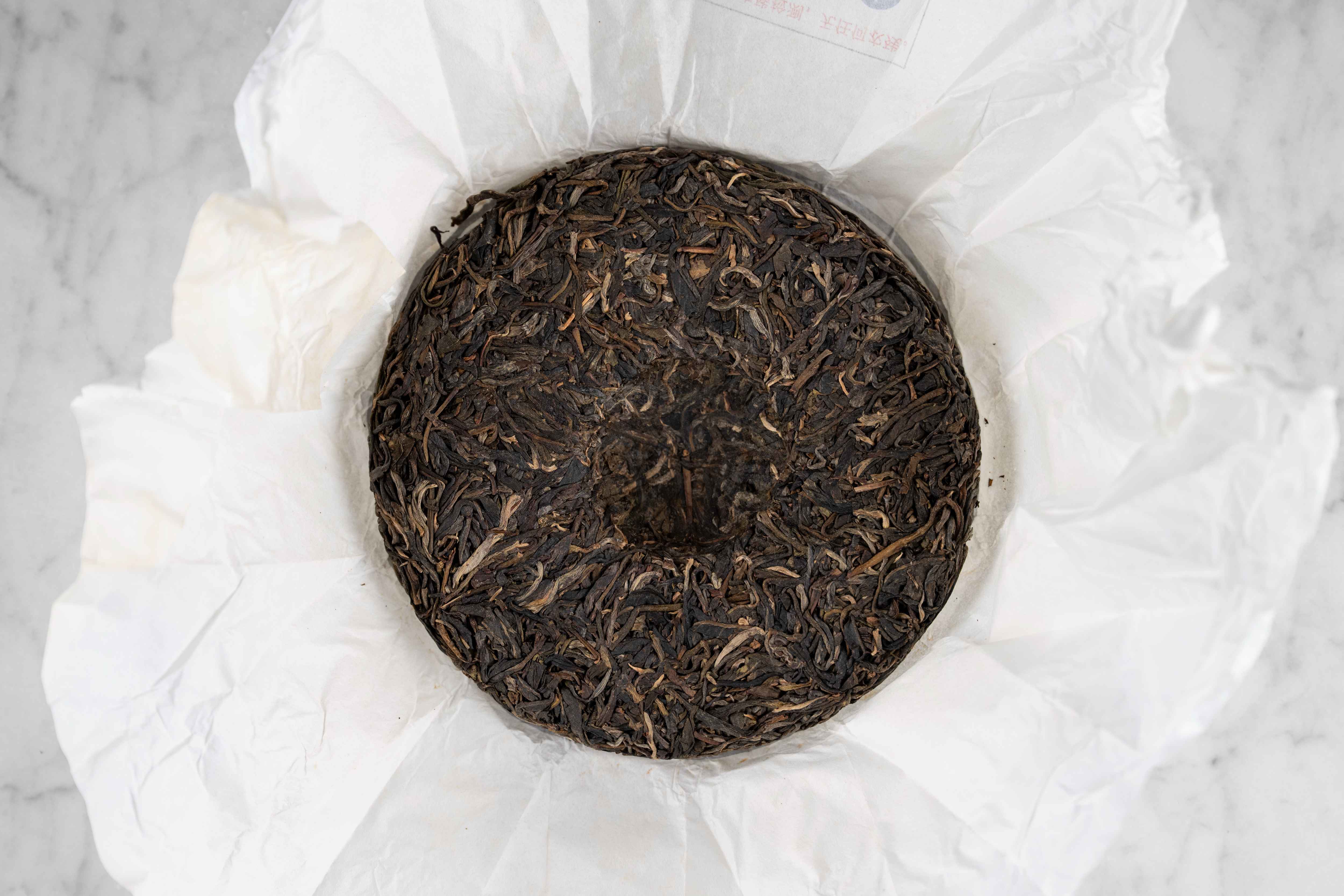 2019 Jingmai Old Forest aged tea cake unwrapped