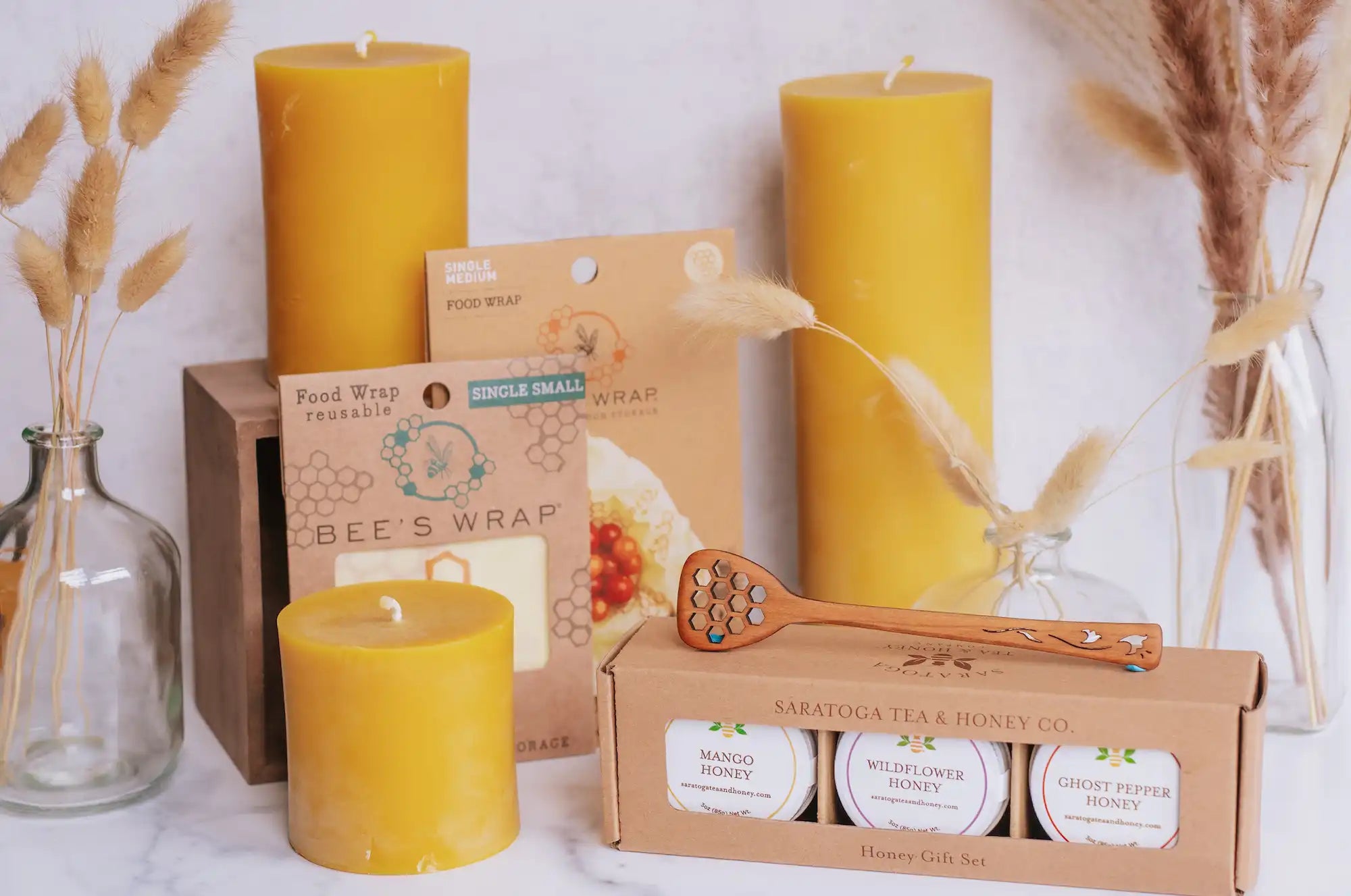 beeswax candles, beeswrap, honey accessories, and honey gifts