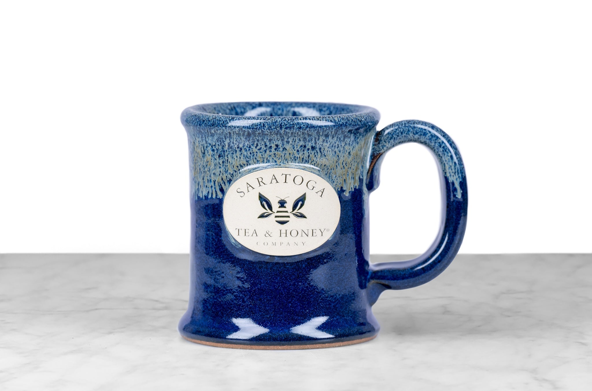 "Northern Lights" Ombre light to dark blue mug with saratoga tea and honey co. logo