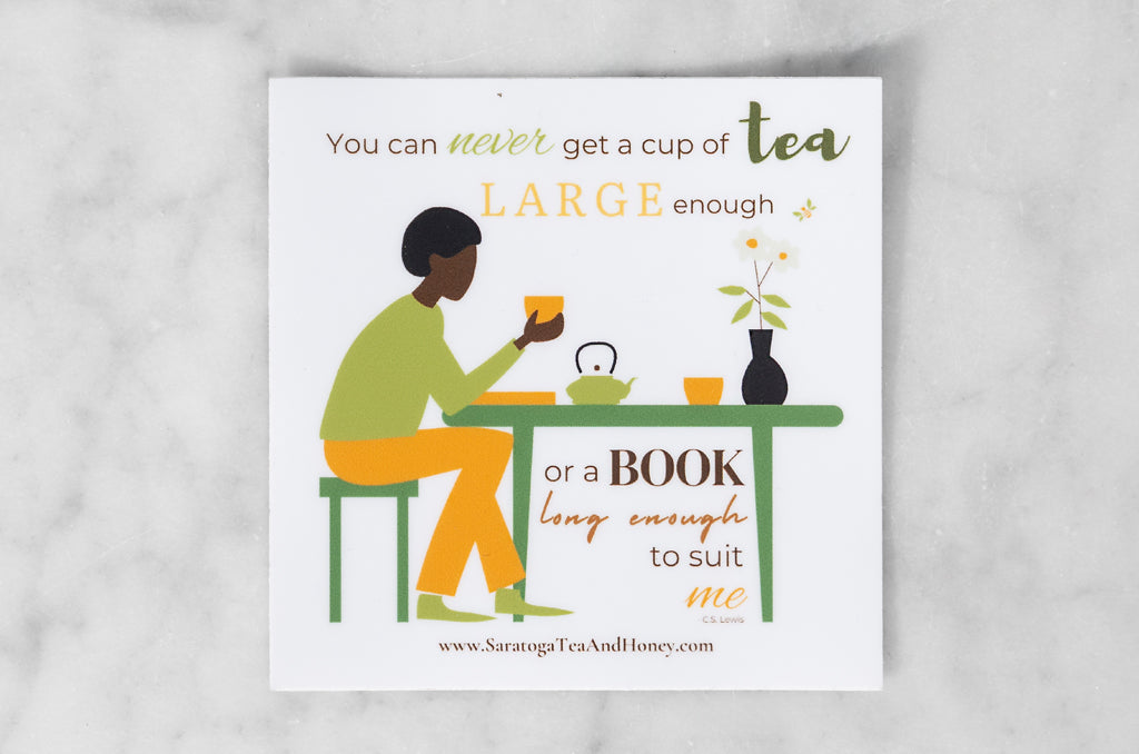 vinyl sticker featuring illustration of man drinking tea at a table while reading with the cs lewis quote: you can never get a cup of tea large enough or a book long enough to suit me.