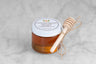 mini 3 oz jar of Carolina Reaper honey from Saratoga Tea & Honey co. with twine and mini dipper perfect for stocking stuffers or small gifts