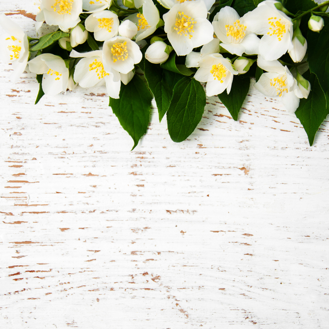 white washed wood with flowers and leaves