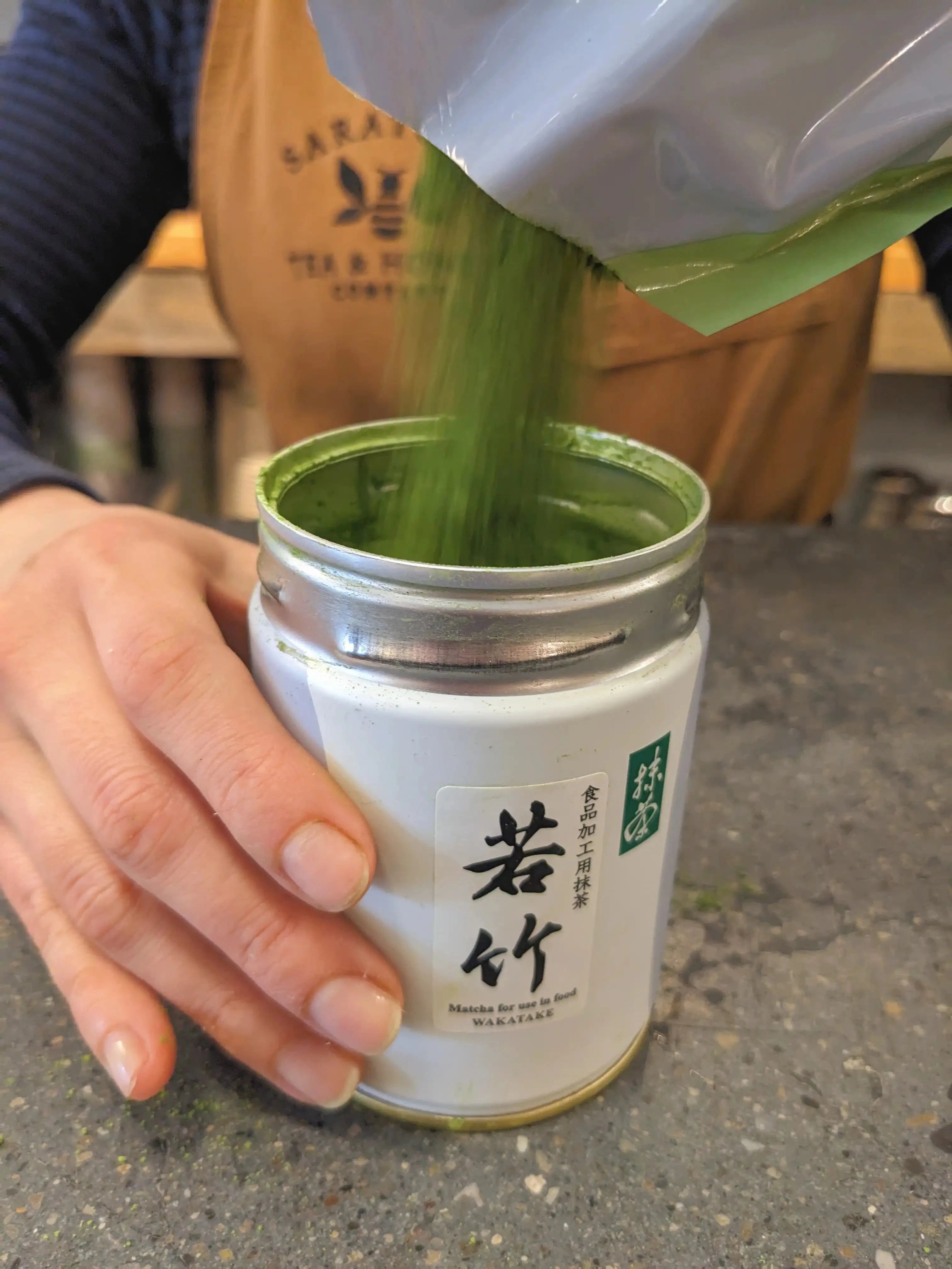 Refilling a Matcha Wakatake Tin for 10% off to encourage sustainability!