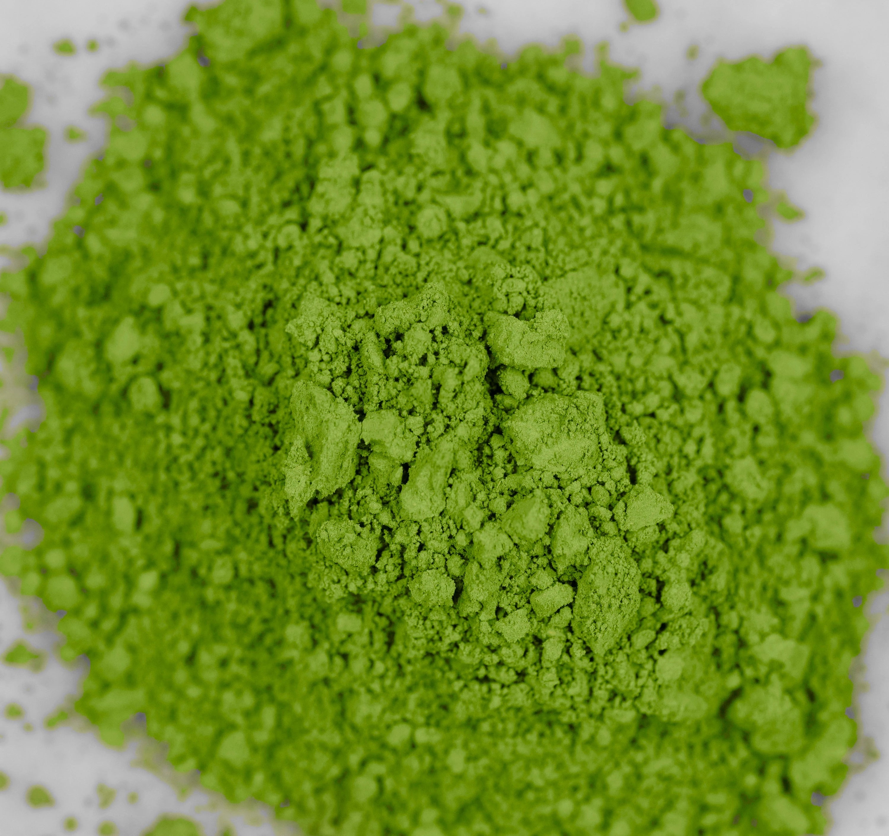 Matcha Wakatake green tea powder close up showing fine powder consistency and vibrant green color
