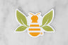 Saratoga Tea & Honey Co registered trademark tea bee sticker on marble background