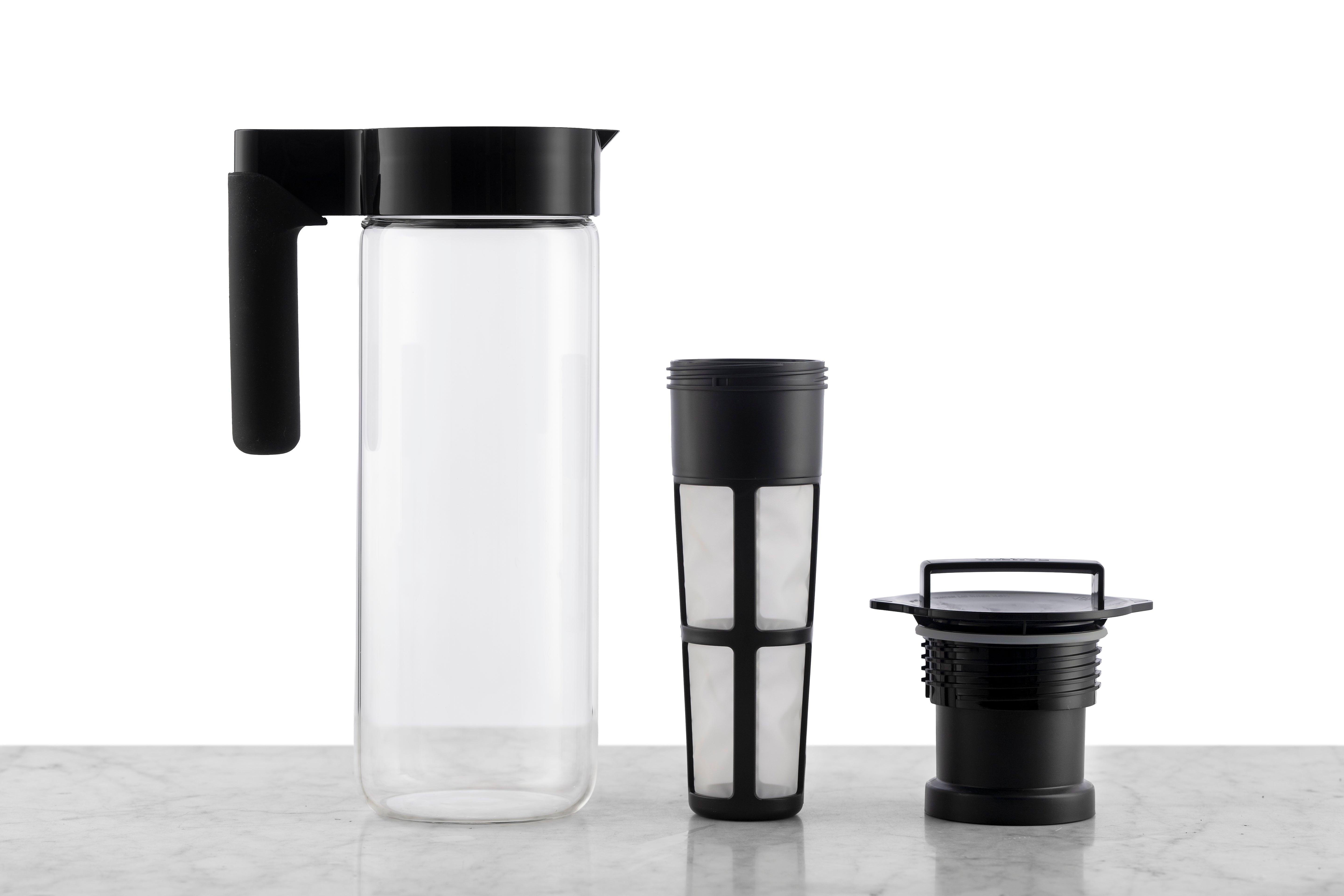 A 2 quart glass iced tea pitcher with a detachable infuser for loose leaf tea.