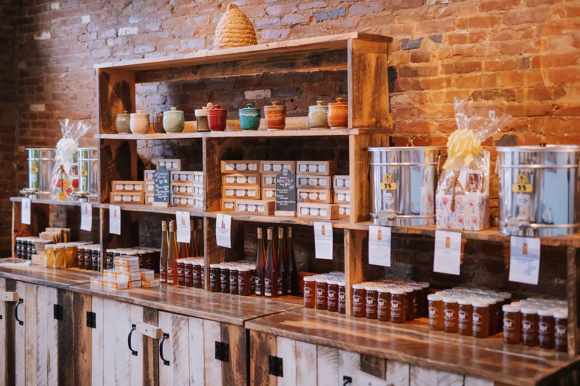 wall of monofloral raw honeys at Saratoga Tea & Honey Co. in Saratoga Springs NY