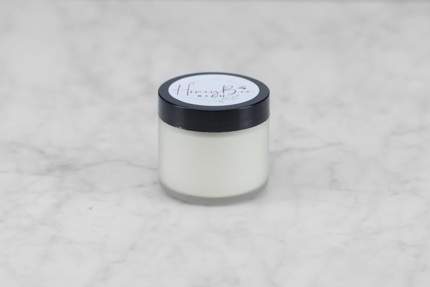 small jar of beeswax and olive oil lotion
