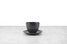 black minimalist handleless tea cup and saucer