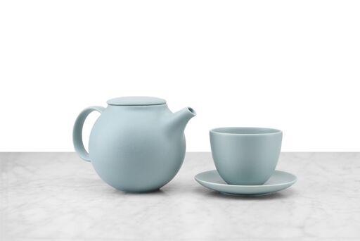 mint green minimalist tea pot with matching cup and saucer 