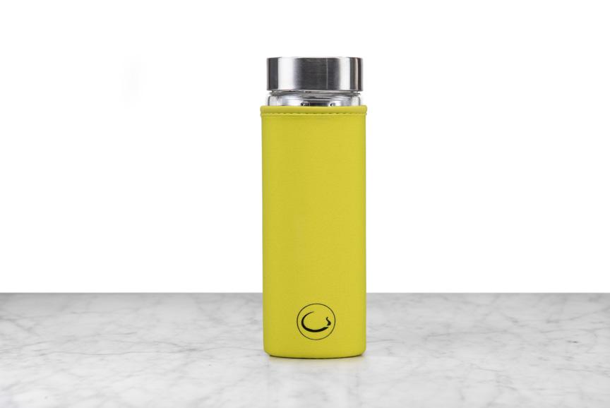 green neoprene protector on glass flask infuser