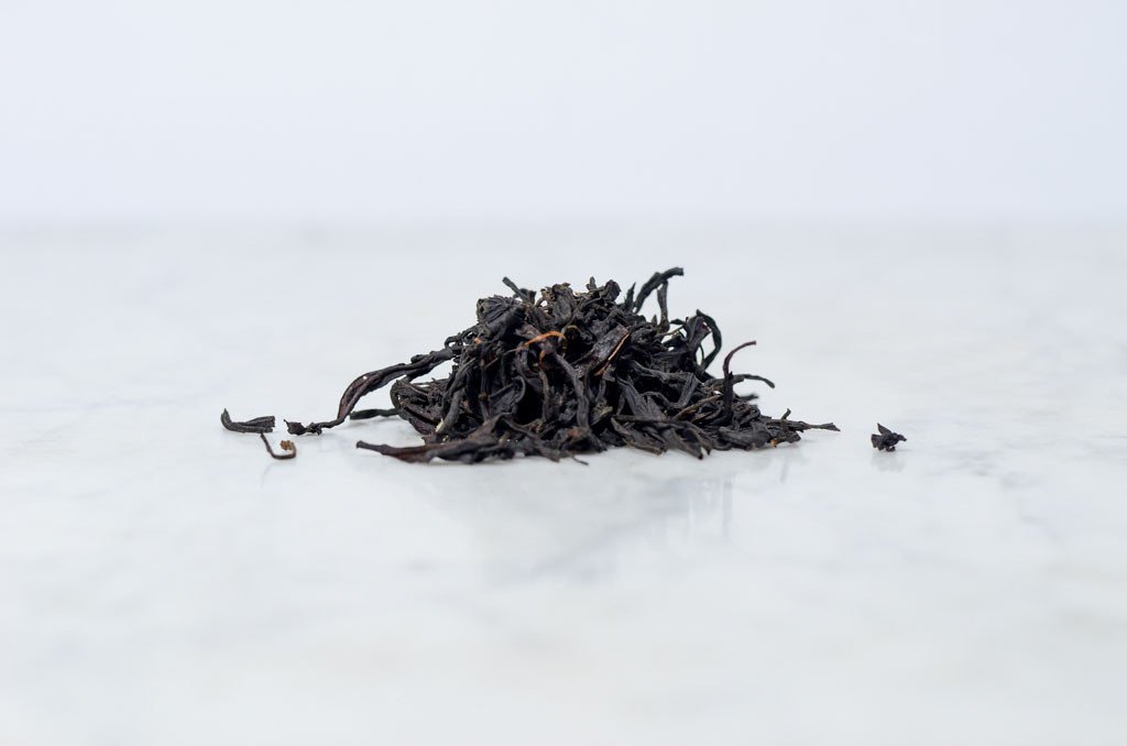 pile of Feng Huang Hong Cha black loose leaf tea