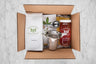 get well soon gift set featuring health potion herbal tisane, raw honey and stainless steel infuser