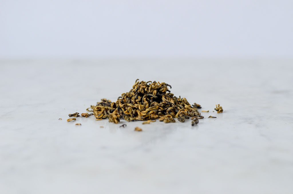 Jin Die rolled golden bud black loose leaf tea