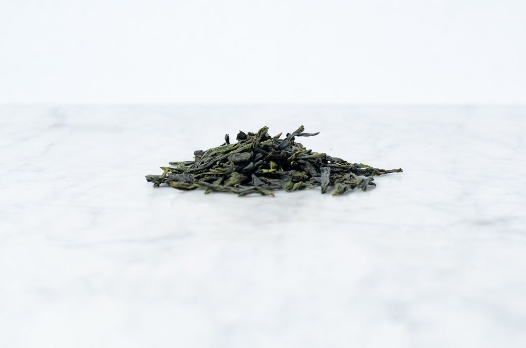 pile of loose leaf Lu An Gua Pian green tea