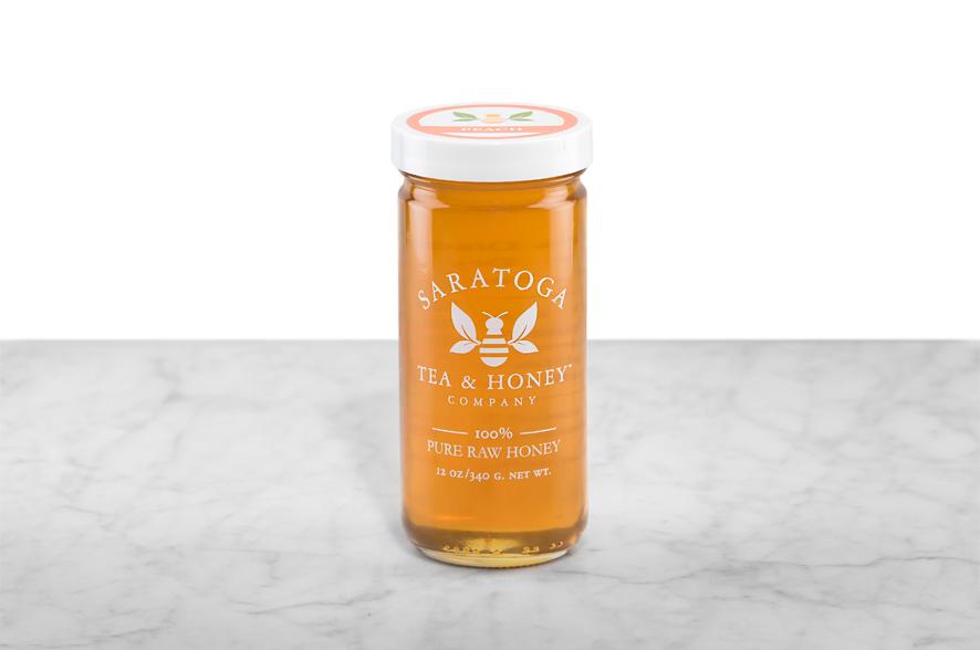 12oz Jar of Peach Infused Raw Honey