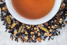 Pumpkin Spice Chai Surrounding A Teacup