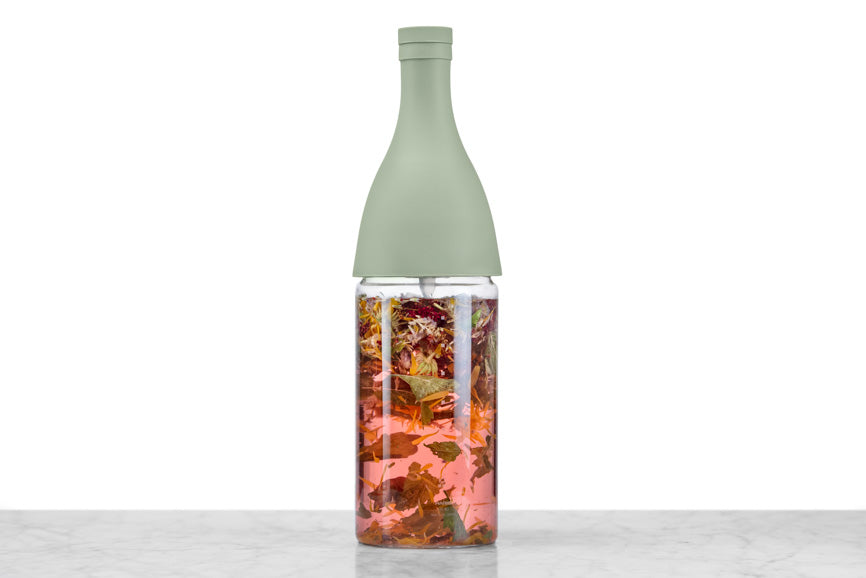 iced tea bottle full of brewing tranquilite herbal tisane
