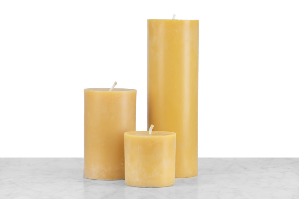 cluster of 3 varied size beeswax pillar candles