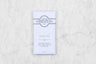white paper wrapped Saratoga Chocolate Co. Genmai Cha Dark Chocolate Bard with Sencha Tea and crunchy popped rice