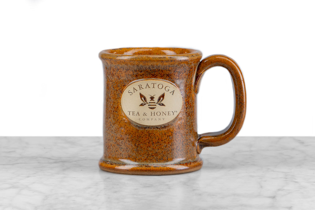 microwave, oven, and dishwasher safe sand stoneware bee mug with saratoga tea and honey co logo