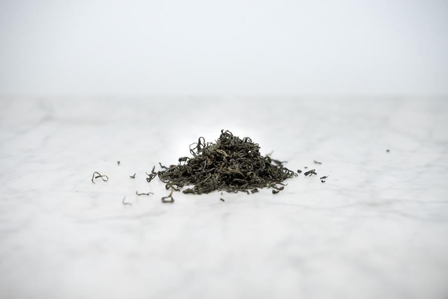 loose leaf green tea from Vietnam on a marble background