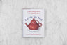 little tea book on a marble background